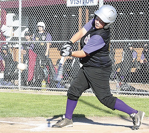 Logan Gonzales smacks a double off the fence for the North Whidbey 10/11 baseball team Tuesday.