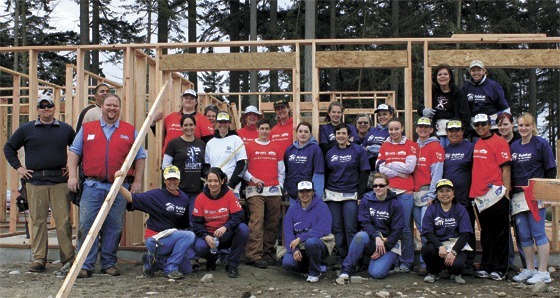 Women gathered to work on the new Habitat for Humanity house going up in Oak Harbor.