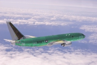 The P-8A Poseidon in mid-flight during the plane’s inaugural test-run Saturday.