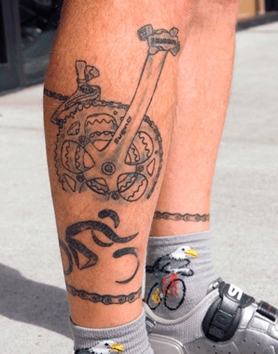 Mike Merickel’s passion for bikes is evident in body art and attire.