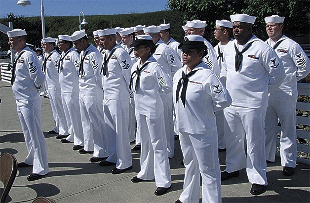 Sailors stand at parade rest during Tuesday’s commemoration ceremony for the Battle of Midway.