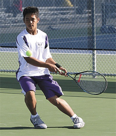 Casiano Atienza volleys in a win over Marysville-Pilchuck Wedensday. Atienza and partner Antonio Unpingco took second doubles in three sets.