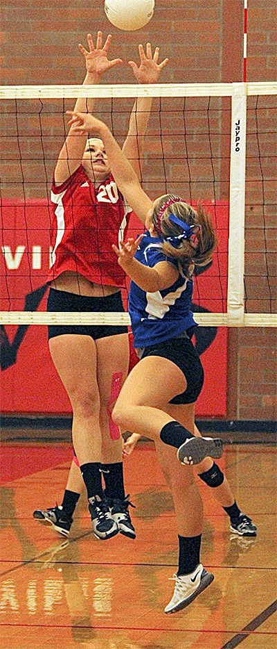 Madeline Strasburg goes up to block a Chimacum hit Thursday.