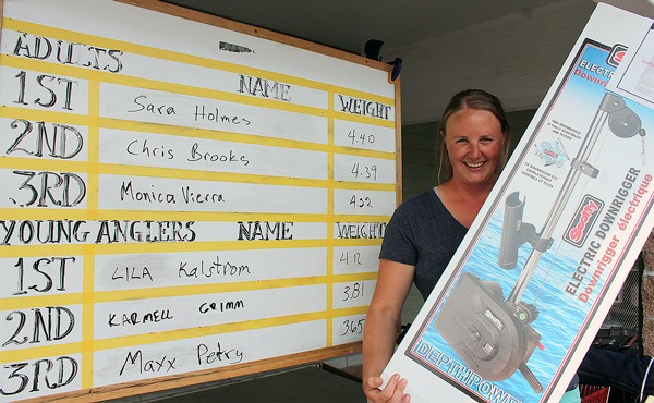 Ben Watanabe / The Record Above: Sarah Holm holds up her first-place prize