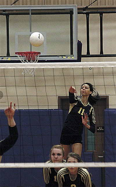 Though the ball appears to be heading into the basketball goal