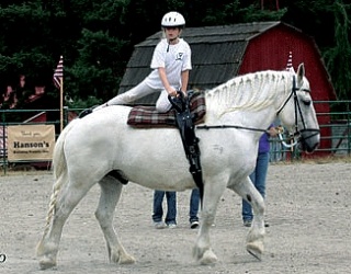 Faith Lamb hops on Sampsonite at the HOPE Open House and Horse Show.