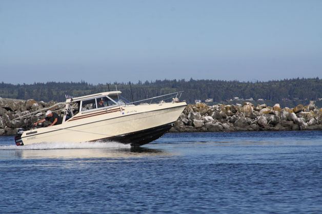 A boater launches toward the waters of Admiralty Inlet on the last day of chinook season in Marine Area 9 Aug. 4.