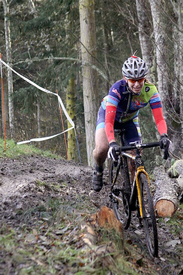 Jodi Duquette of Seattle avoids a slippery slope and opts for a different path around an obstacle at a cyclocross race Nov. 22 at Fort Nugent Park. Some riders went sideways on this challenging part of the 1.2-mile course.
