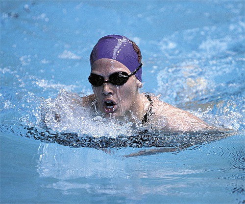 Tori Nickerson competes for Linfield College in the breaststroke.
