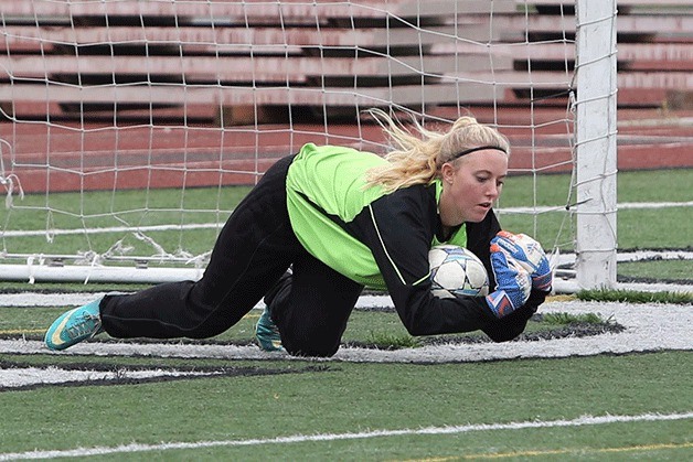Makenzie Perry is back to defend the goal for the Oak Harbor soccer team. The keeper is one of nine seniors returning for the Wildcats this fall.
