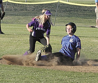 Central Whidbey's Hannah Davidson steals second in Monday's game.