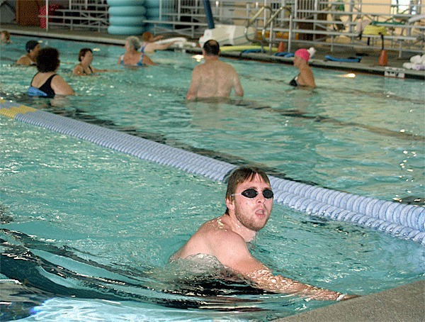 Greg Case swims laps at the John Vanderzicht Memorial Swimming Pool. North Whidbey Park and Recreation officials are looking at ways to expand the popular facility to meet the needs of more people