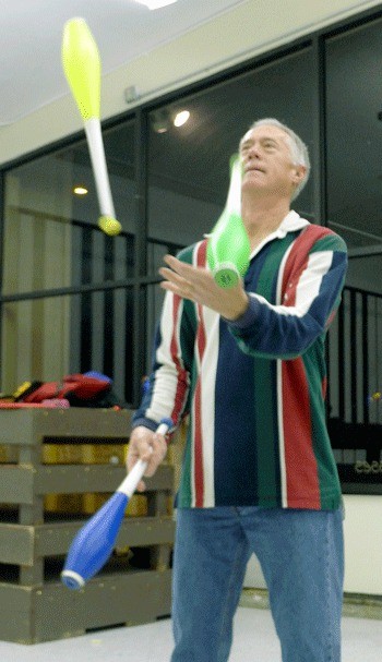 Dave Thompson juggles Wednesday night at Click Music. He is a  member of the Whidbey Island Jugglers