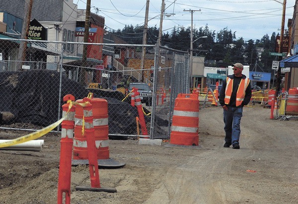 Rick Fakkema of Oak Harbor Public Works patrols the area of SE Pioneer Way where the remains of Native Americans were unearthed. Following another discovery this week