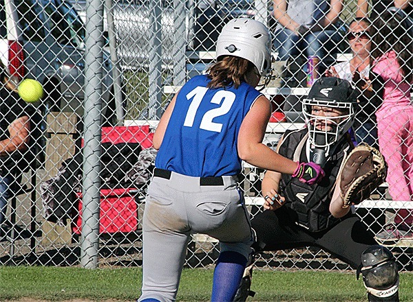 North/Central Whidbey catcher Kayla Carr receives a throw and tags out Sedro-Woolley's Keely Ross Tuesday.