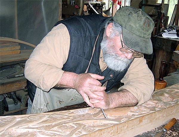 Glen Russell works on his last piece for the Sno-Isle Libraries Coupeville Library.