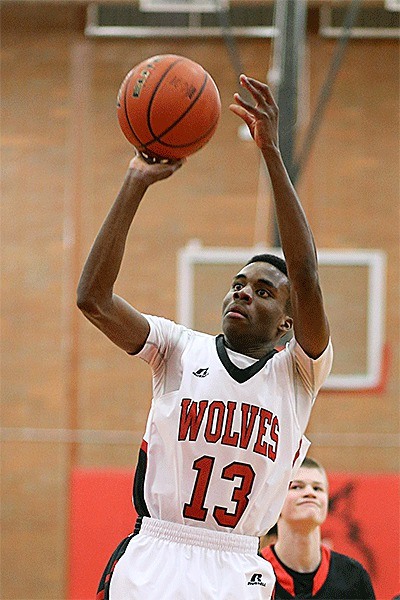 Dante Mitchell aims for two for the Wolves Tuesday.