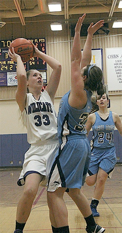 Hayley Lundstrom (33) is a senior captain on the Oak Harbor High School girls basketball team.