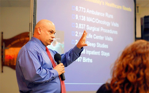 Whidbey General Hospital CEO Tom Tomasino gives a presentation to Oak Harbor Chamber of Commerce members on the hospital’s $50 million bond proposal.