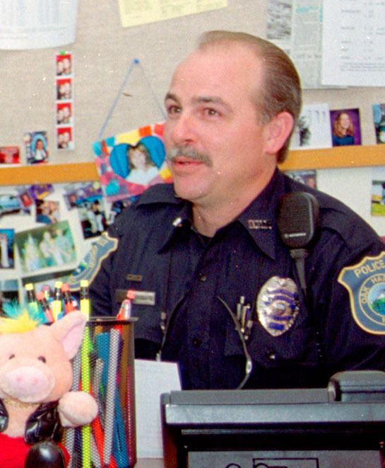 Oak Harbor Police Officer John Little was high school resource officer in this photo from 2003.