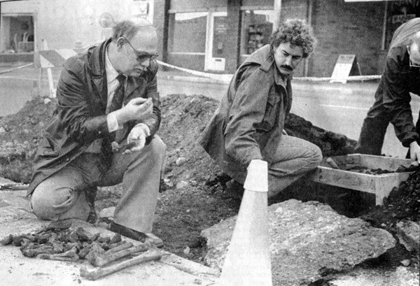 A 1983 photo in the Whidbey News-Times shows then-Oak Harbor Assistant Police Chief Pete Gaalema examining a bone passed to him by Officer Steve Johnson. The bones were believed to have been Native American and were found on SE Pioneer Way.