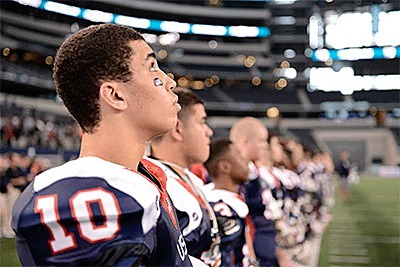 Oak Harbor's Mac Carr (10) stands with his teammates at International Bowl Jan. 31.