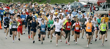A mob of runners take off from Cornet Bay during the ninth annual Whidbey Island Marathon Sunday