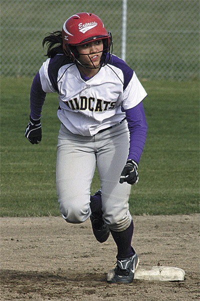 Shawna Steele takes off from second base in Oak Harbor's game Monday. Steele finished with four hits