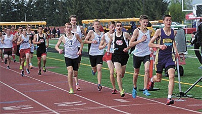 Oak Harbor's John Rodeheffer takes the lead on the way to winning the 3