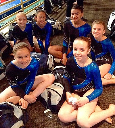 Some of the Island Flyers enjoy a break during the regional championships.