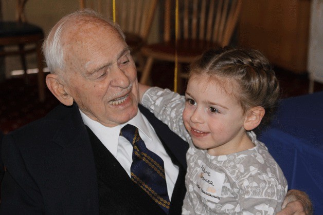 Harvey Lasell shares a moment with his great-granddaughter