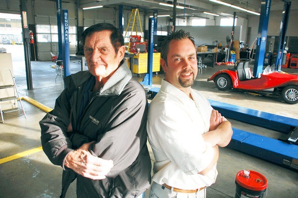 Ray Sizemore and Joel Mami stand inside the recently refurbished garage of what was formerly Frontier Chevrolet on SE Pioneer Way.