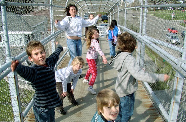 Coupeville Boys and Girls Club members participate in a national effort to set a Guinness World Record for the most people doing jumping jacks