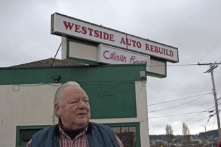 Monte Rollag holds one of the tools his uncle used at Westside Auto Rebuild