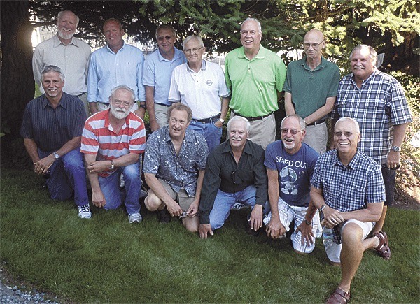 Members of the 1971 Oak Harbor High School track team attended a reunion at coach Eric Lindberg's home July 28: (back row