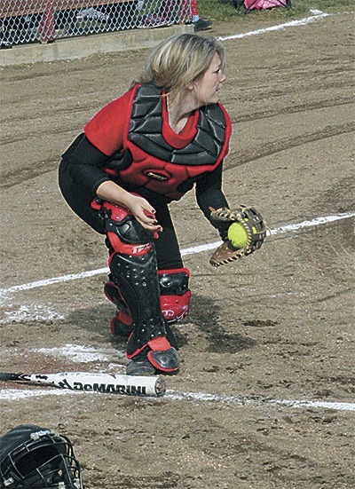 Coupeville catcher Bree Messner fields a throw from the outfield to hold a Granite Falls runner at third Wednesday.