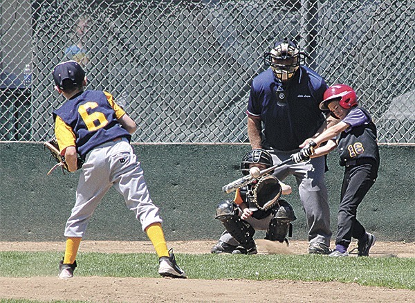North Whidbey's Gage McLeod takes a cut at the 9-10 Little League tournament in Langley Saturday.