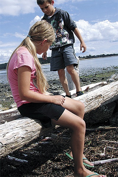 Members of Team A led by James Burkes and Michelle Maxwell play on their rendition of “Deception Pass Bridge