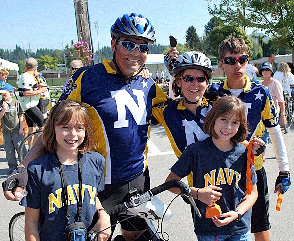 Sharon Dodge (third from left) is shown with her family. She’s pedaling for Team Navy in the Bike MS Ride Sept. 11 and 12.