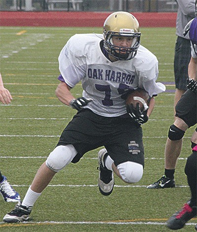Quinn Karney looks for a hole in the Sedro-Woolley defense.