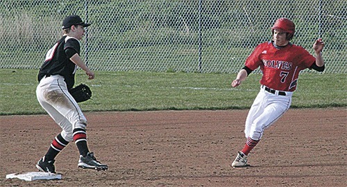 Coupeville's Jake Tumblin begins his slide at second base against Archbishop Murphy Wednesday.