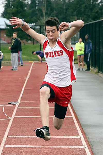 Coupeville's Mitchell Carroll jumps a personal best 35-07 in the triple jump Thursday.