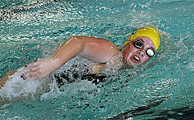 Sophie Dickinson swims to a win in the 50 freestyle in Monday's meet.
