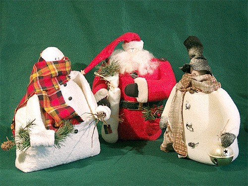 One-of-a-kind art like snow people by Lori Miller and “Christmas Cardinal” by Sandy Dupernill.