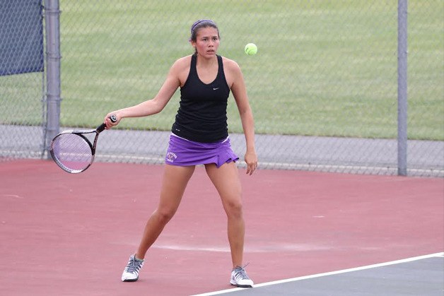 AnnaBelle Whitefoot returns a shot in her consolation match Wednesday.