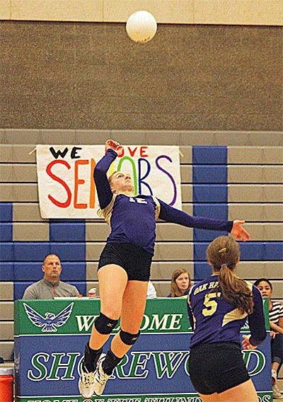Oak Harbor's Claire Anderson rises for a kill from the back row in the Wildcats' win Tuesday.