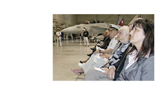 Dignitaries-a-plenty were packed into Hangar 12 like sardines during Tuesday’s Growler Dedication Ceremony at Whidbey Island Naval Air Station. Capt. Gerral David