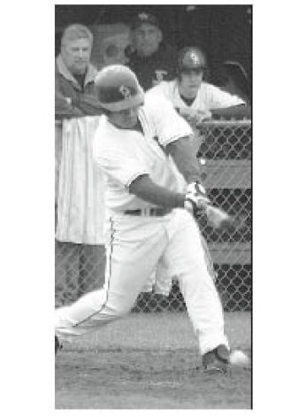 Oak Harbor all WesCo North outfielder Chris Valencia gets a hit.