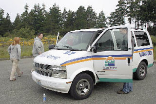 Driver Kris Lohmann and passengers David Scott