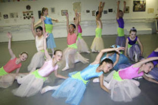 Among the mermaid ballerinas featured above are Kenna Chism
